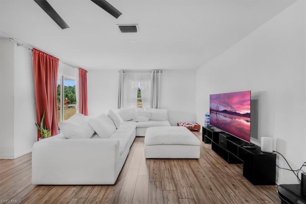 Living room featuring wood finished floors