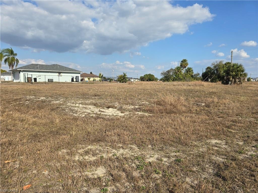 View of yard with a view of countryside