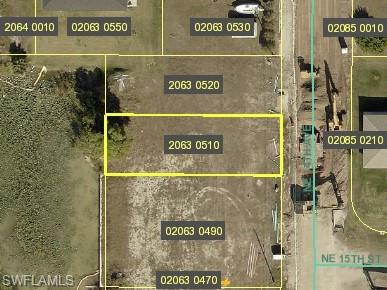 Aerial map of property and surrounding area with property parcel outlined