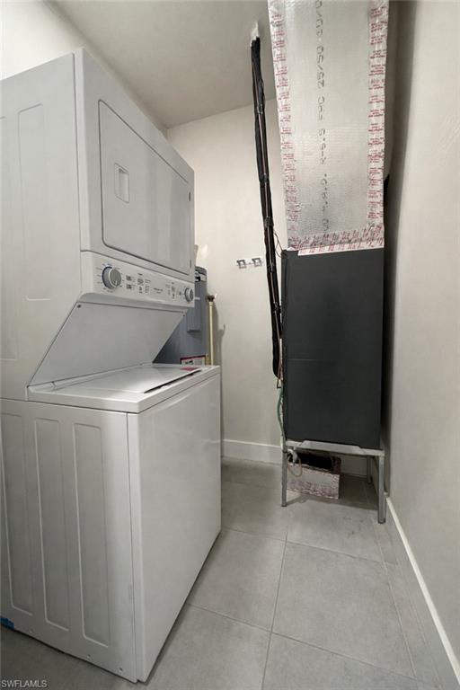 Full bathroom featuring tiled shower and vanity