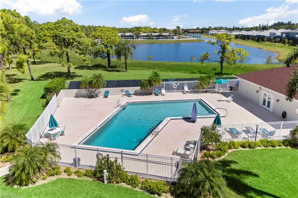Expansive aerial shot highlighting the inviting pool and surrounding amenities in the heart of Bonita Pines.