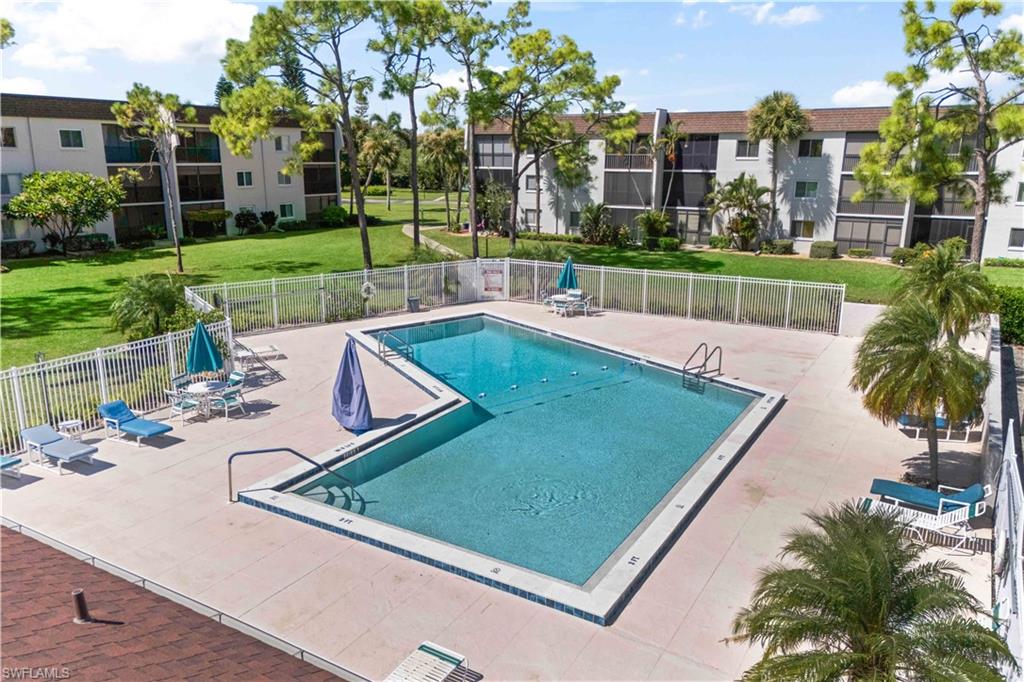 Sparkling resort-style pool nestled in beautifully landscaped grounds.