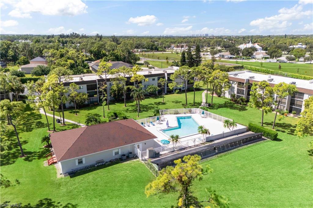 Expansive aerial shot capturing the quiet, well-kept Bonita Pines community with inviting amenities!