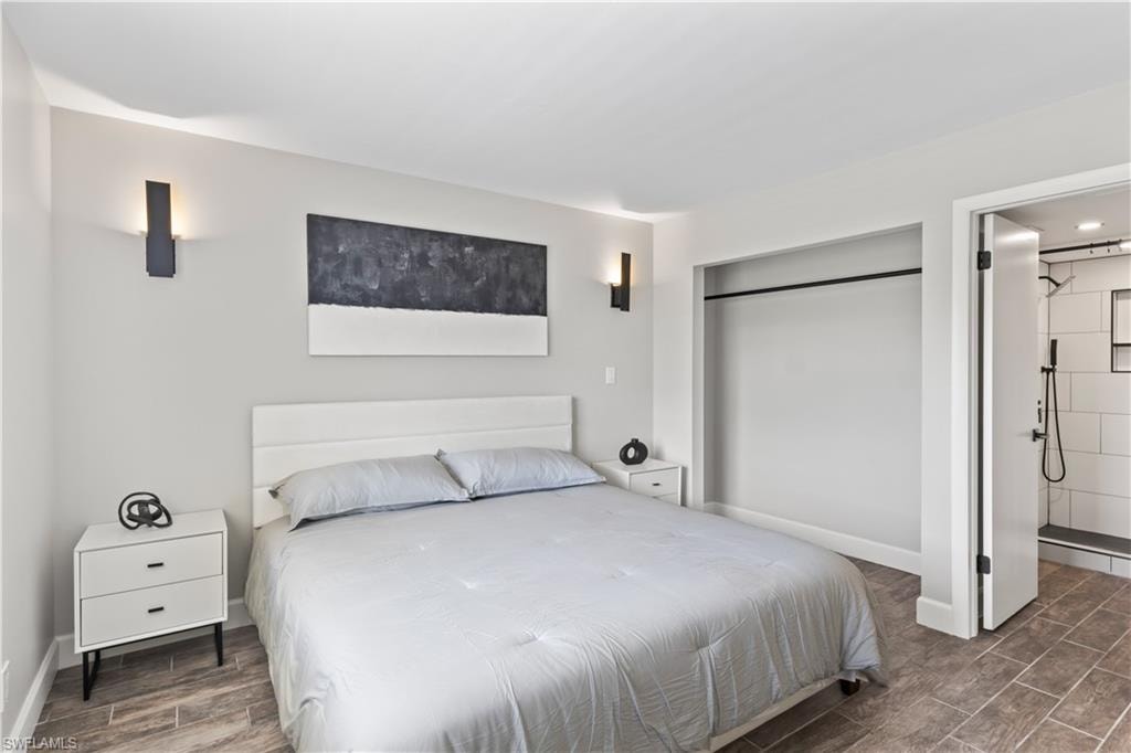 Comfortable guest bedroom with a private ensuite bathroom, offering a cozy and convenient retreat for visitors.