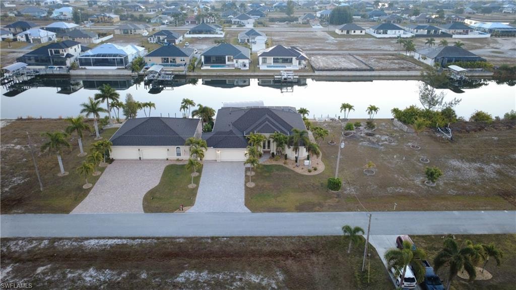 Aerial view of residential area with a nearby body of water