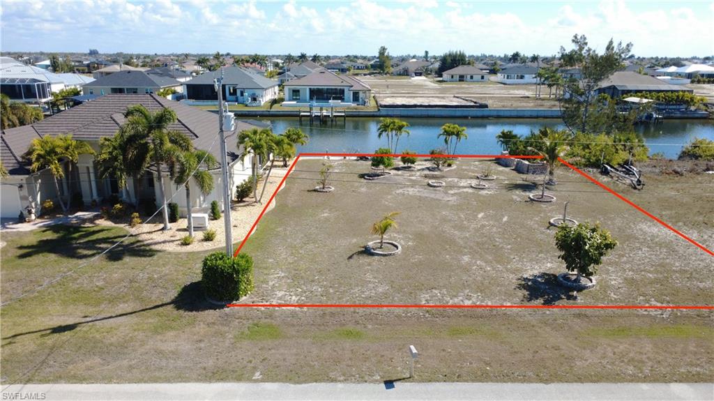 Aerial view of residential area with a nearby body of water