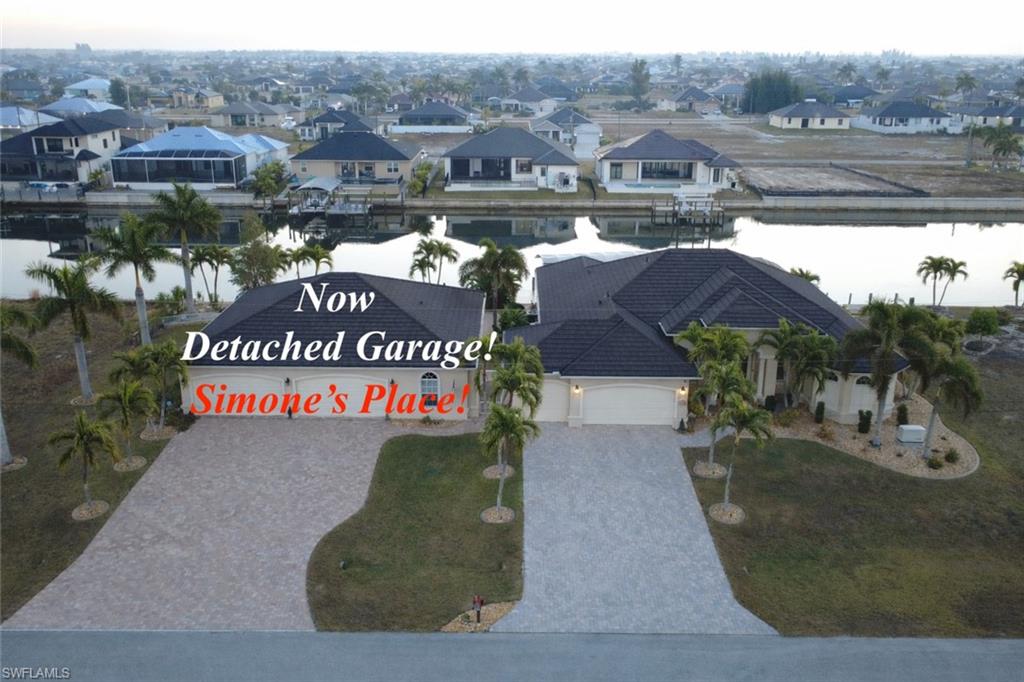 Aerial view of residential area with a large body of water