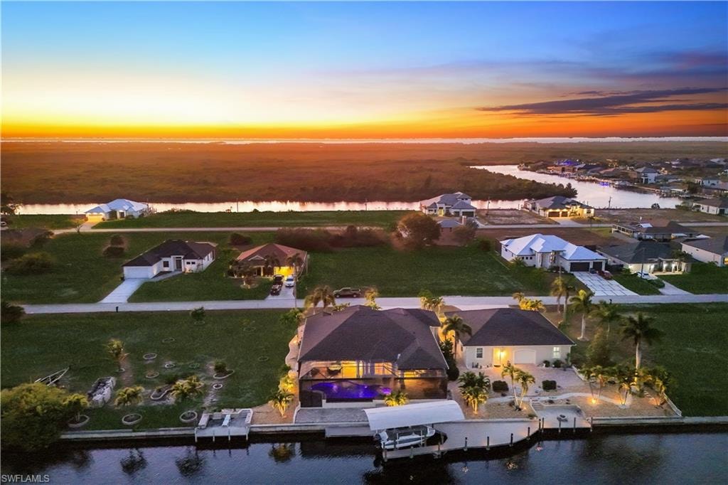 Aerial view of residential area with a nearby body of water