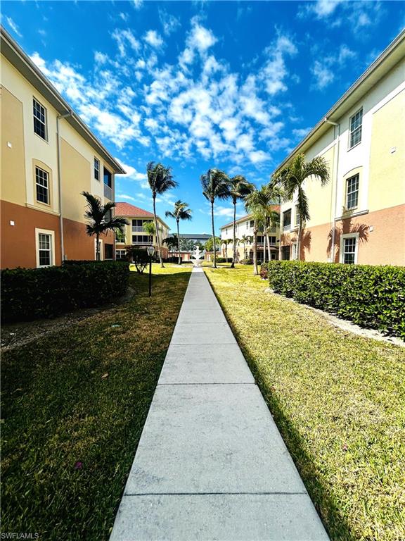 Community Sidewalks with Water Feature in the Background