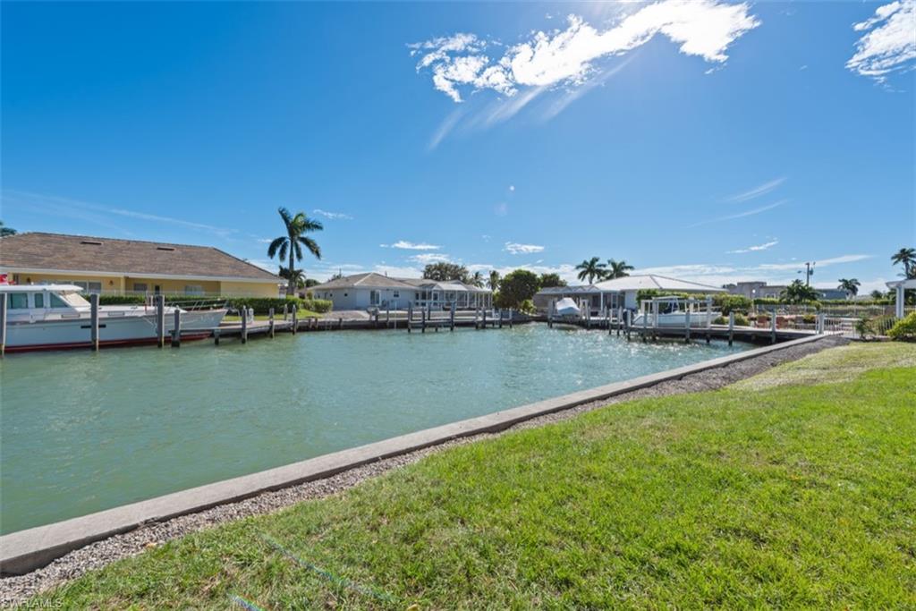 Water view with a boat dock