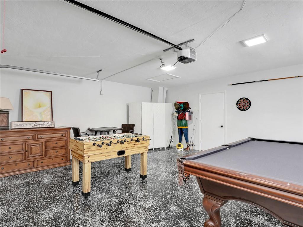 Recreation room featuring a garage and billiards