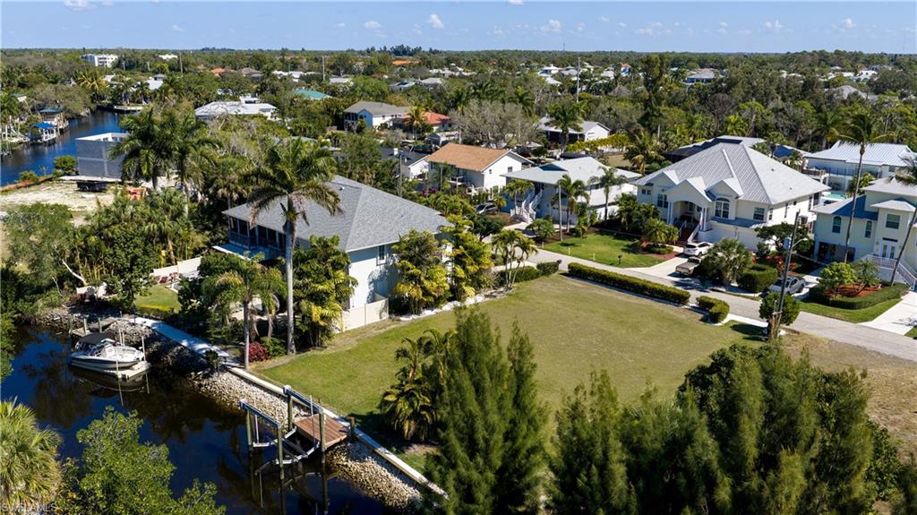 80 x 120 lot is on a peaceful & beloved street with prime West rear exposure for spectacular sunset views over the waterway & ideal sun on your future dream pool.
