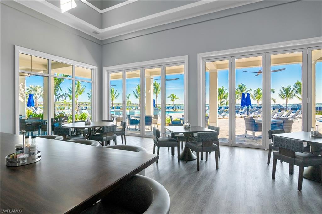 Dining room with healthy amount of natural light and light wood finished floors