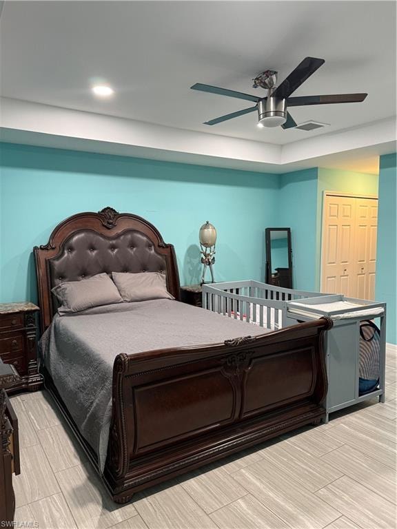 Bedroom with a closet and a ceiling fan