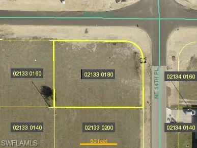 Aerial overview of property's location with property parcel outlined