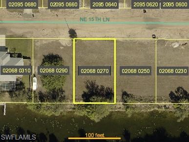 Aerial view of property's location featuring property parcel outlined