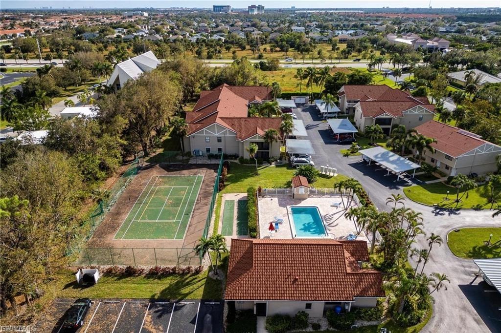 Aerial view of residential area with a pool area