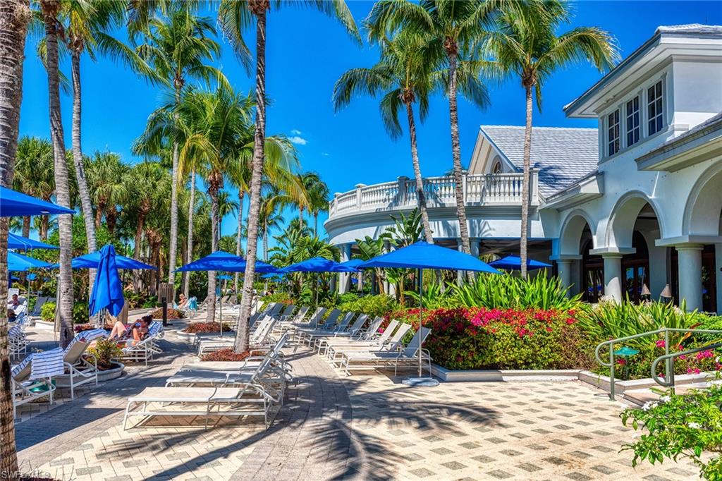 Patio deck inside the Club and Spa Lush Landscaping,,, Plenty of seating & Umbrellas