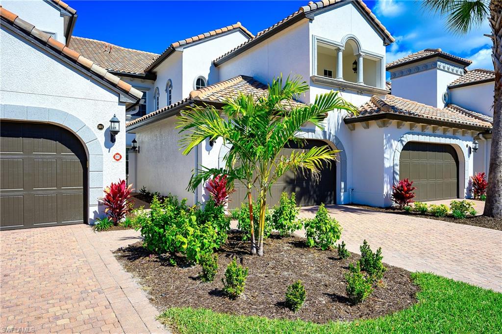 Walkway between the garages leads to your private gated courtyard and your Front Entry Door.