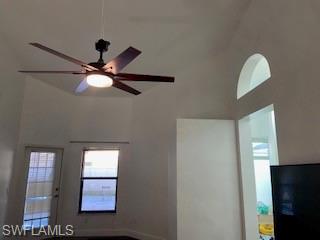 Detailed view of a ceiling fan and baseboards