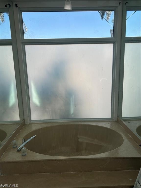 Full bath with a bath