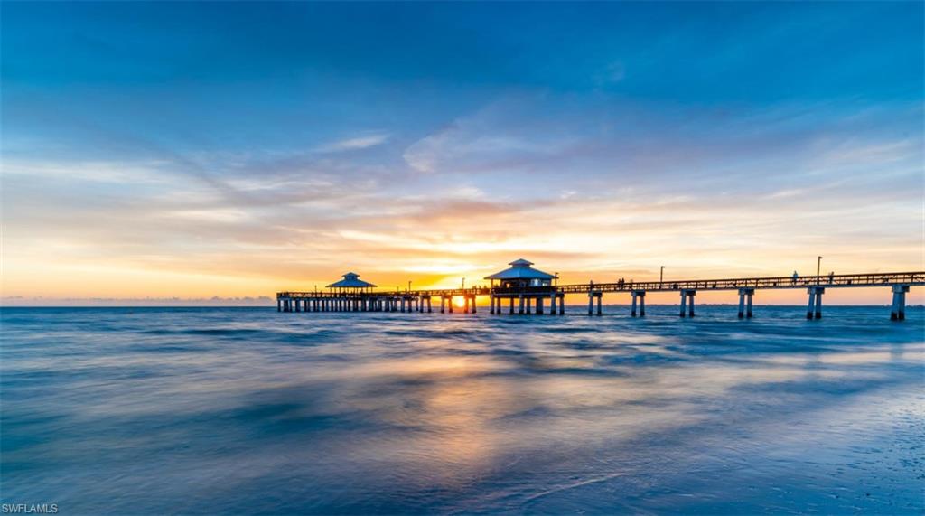 Water view featuring a pier