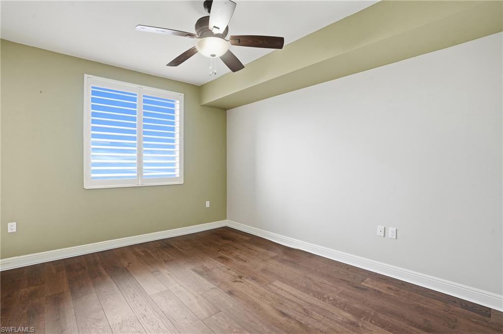 3rd bedroom featuring hardwood flooring and ceiling fan