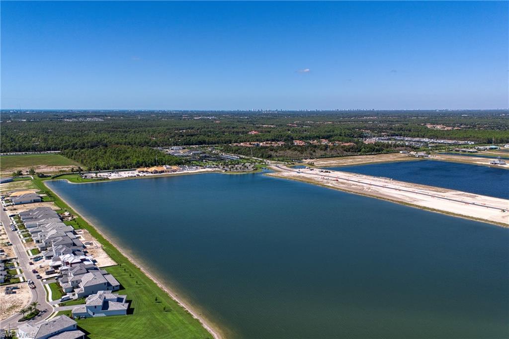 Expansive aerial capturing Caymas’ lakes, preserves and thoughtfully designed layout.