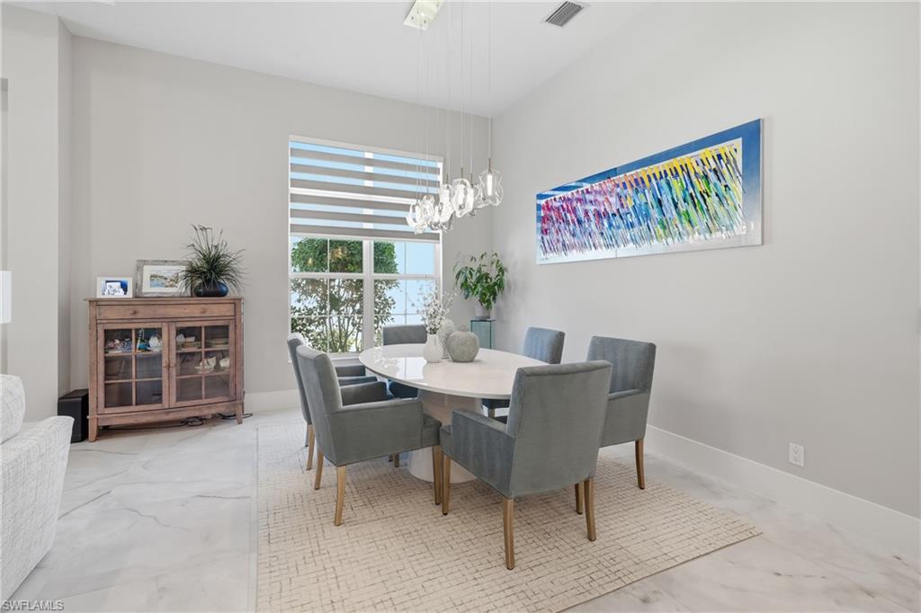 Formal dining space positioned just off the kitchen, ideal for hosting dinner parties and holiday gatherings.