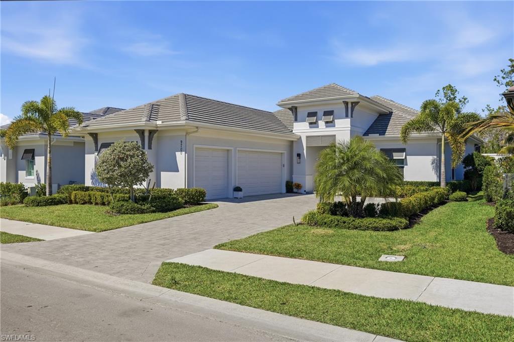 Sophisticated single story elevation set within the gated community of Caymas.