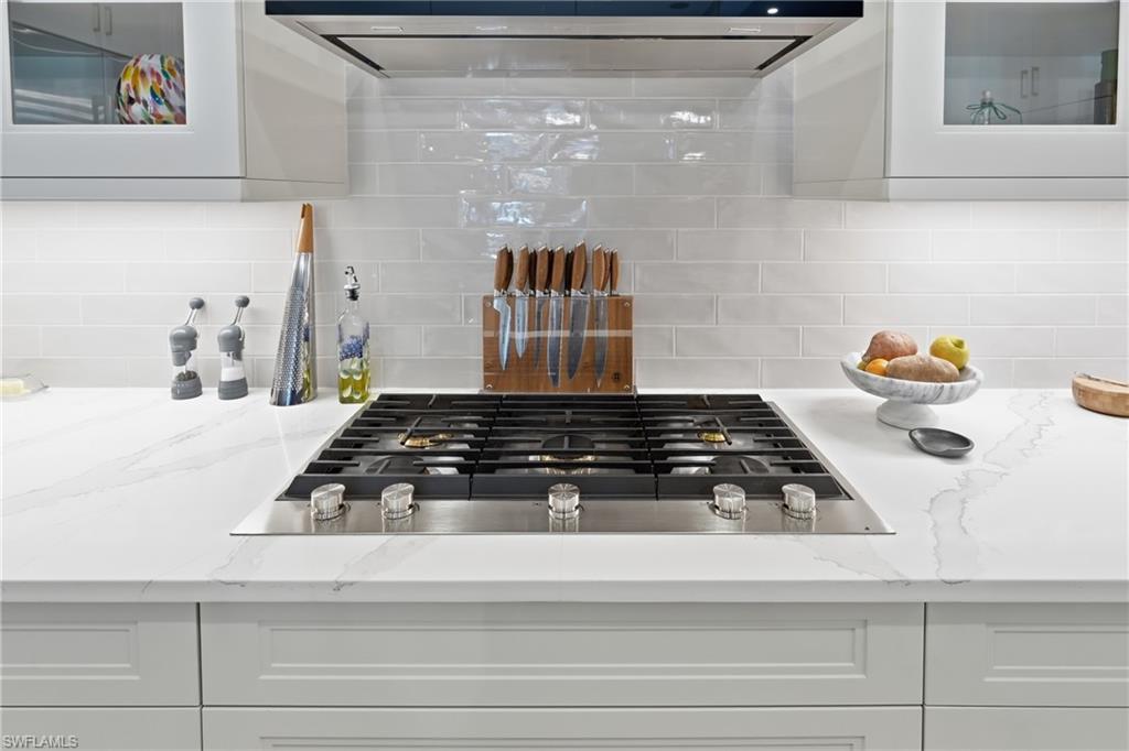 Gas cooking, generous storage and a statement island make this kitchen the heart of the home.