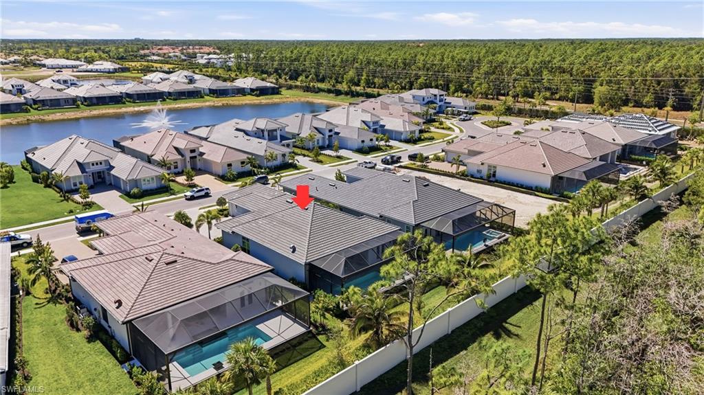 Aerial view highlighting preserve backdrop and spacious lot positioning.