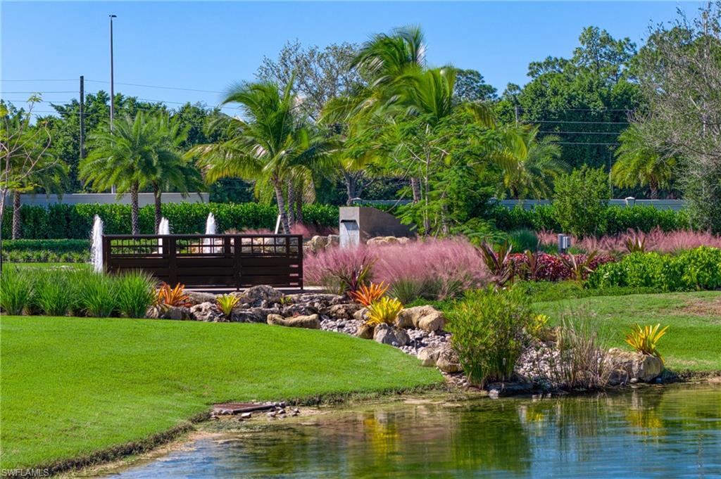Scenic walking bridge connecting residents to lakes, preserves and community amenities.