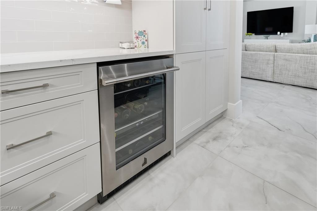 Built in wine cooler seamlessly integrated into the kitchen for effortless entertaining.