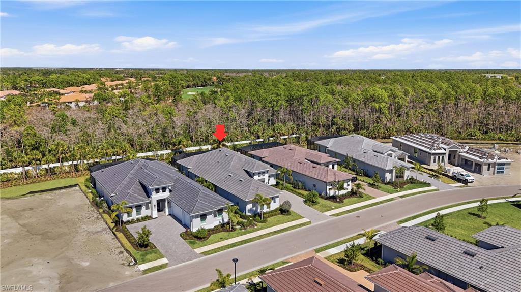 Drone view emphasizing privacy and the home’s seamless integration into the preserve setting.