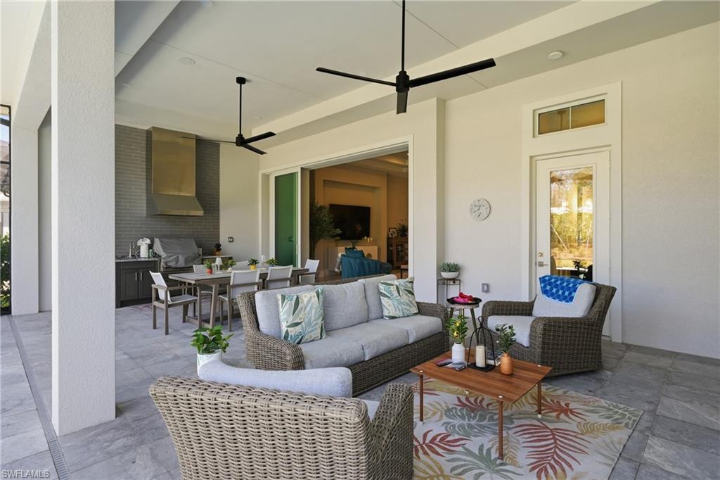 Seamless indoor outdoor living with pocketing sliders opening to nearly 600 square feet of covered lanai.