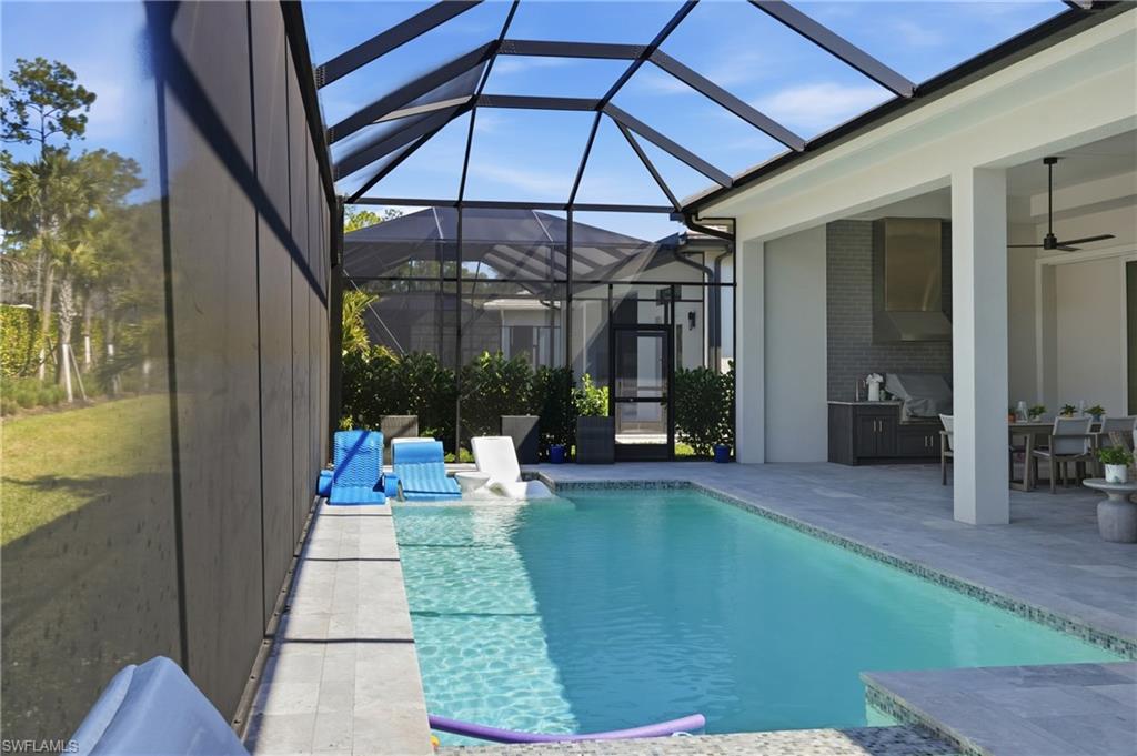 Saltwater pool with generous deck space ideal for lounging and sunset relaxation.
