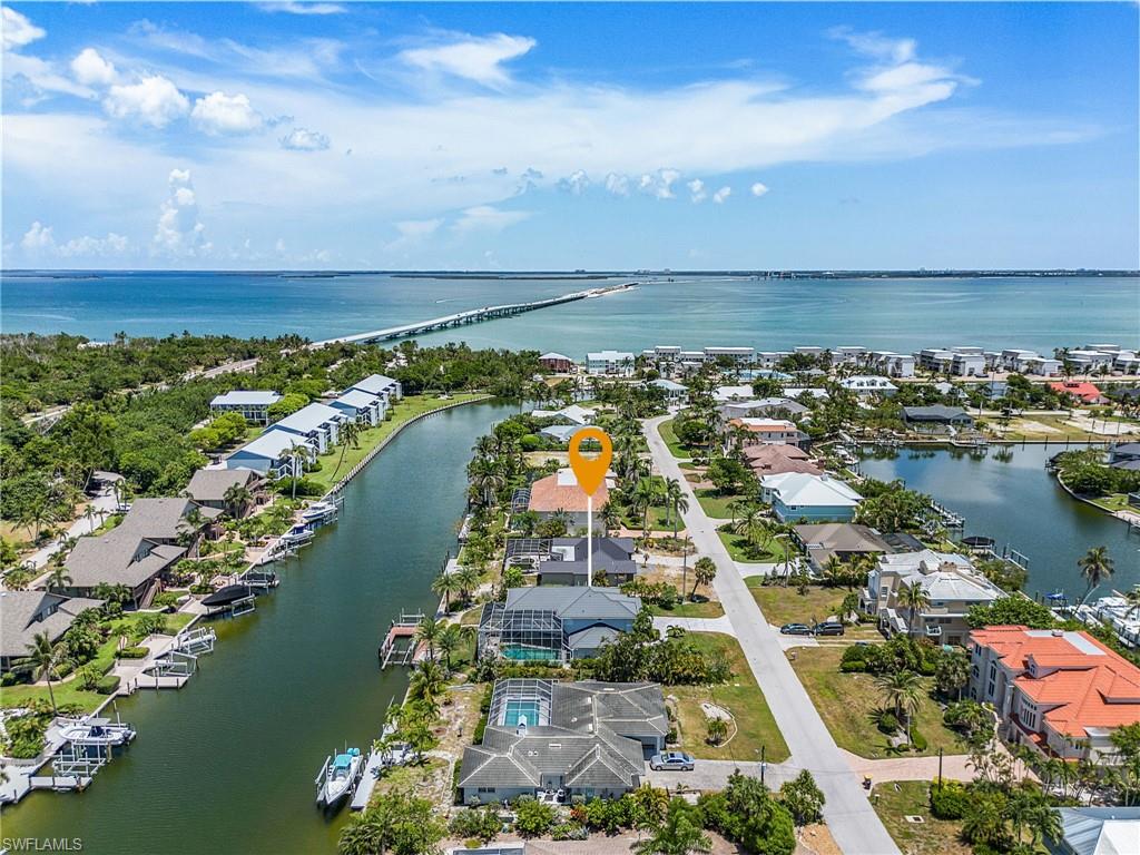 Aerial view of residential area with a large body of water