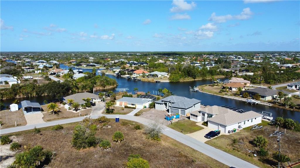 Aerial view of residential area with a large body of water