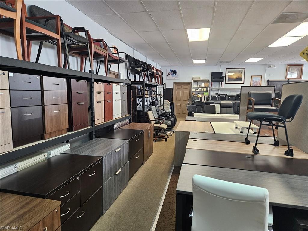 Office featuring a drop ceiling