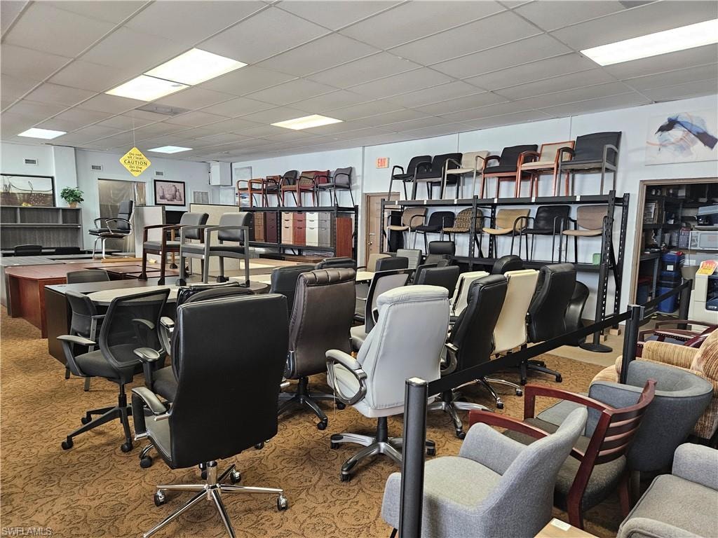 Home office with a drop ceiling
