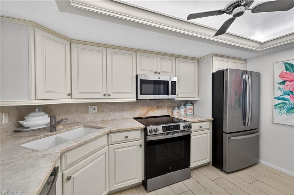 Kitchen with new stainless steel appliances