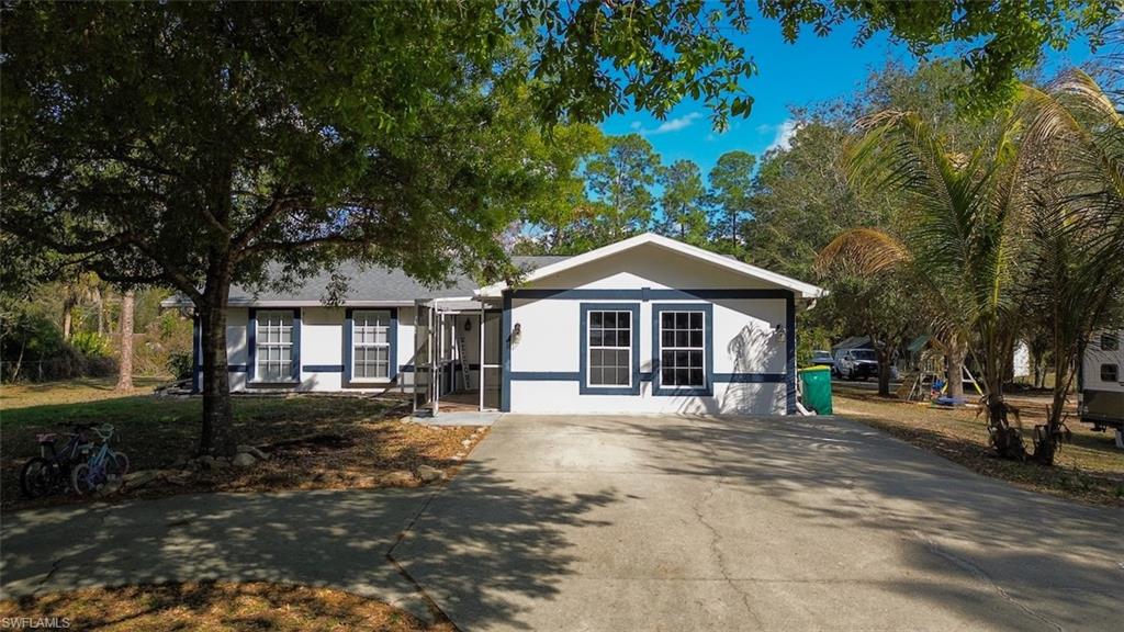 View of front of property featuring driveway