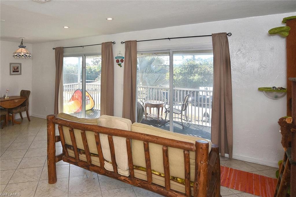 Dining room featuring light tile patterned flooring