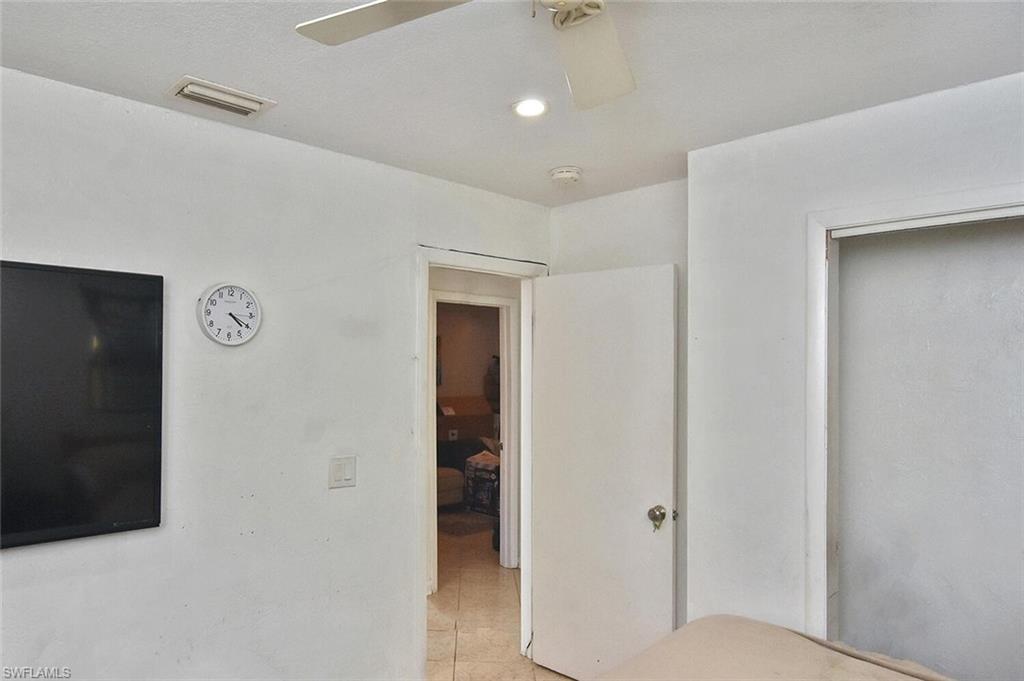 Unfurnished bedroom featuring a ceiling fan and recessed lighting