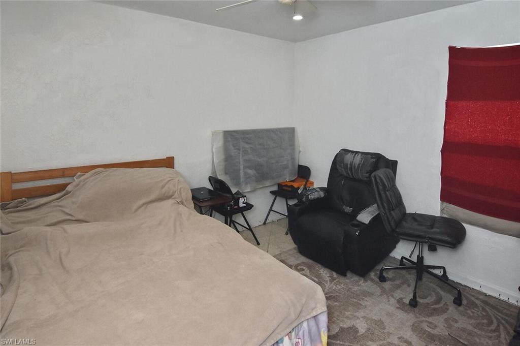 Bedroom featuring carpet flooring and a ceiling fan