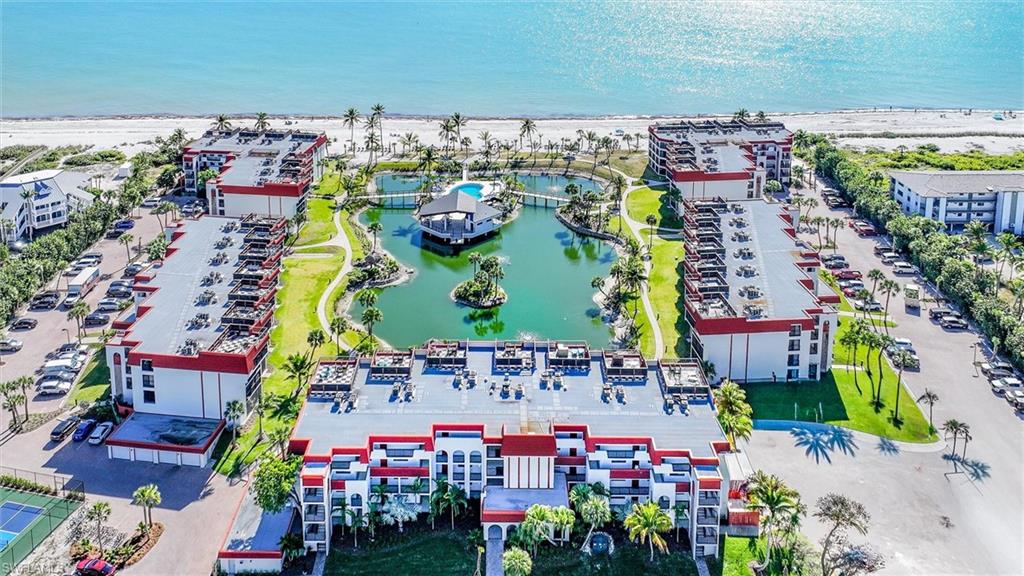 Bird's eye view of a nearby body of water and apartment complex