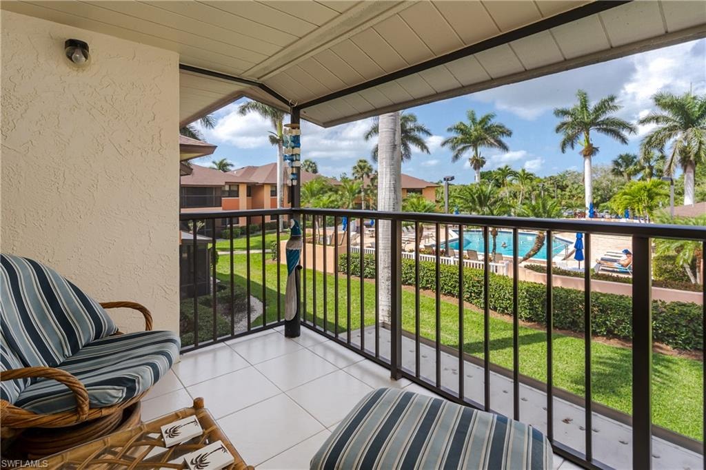 Screened lanai with view of the pool