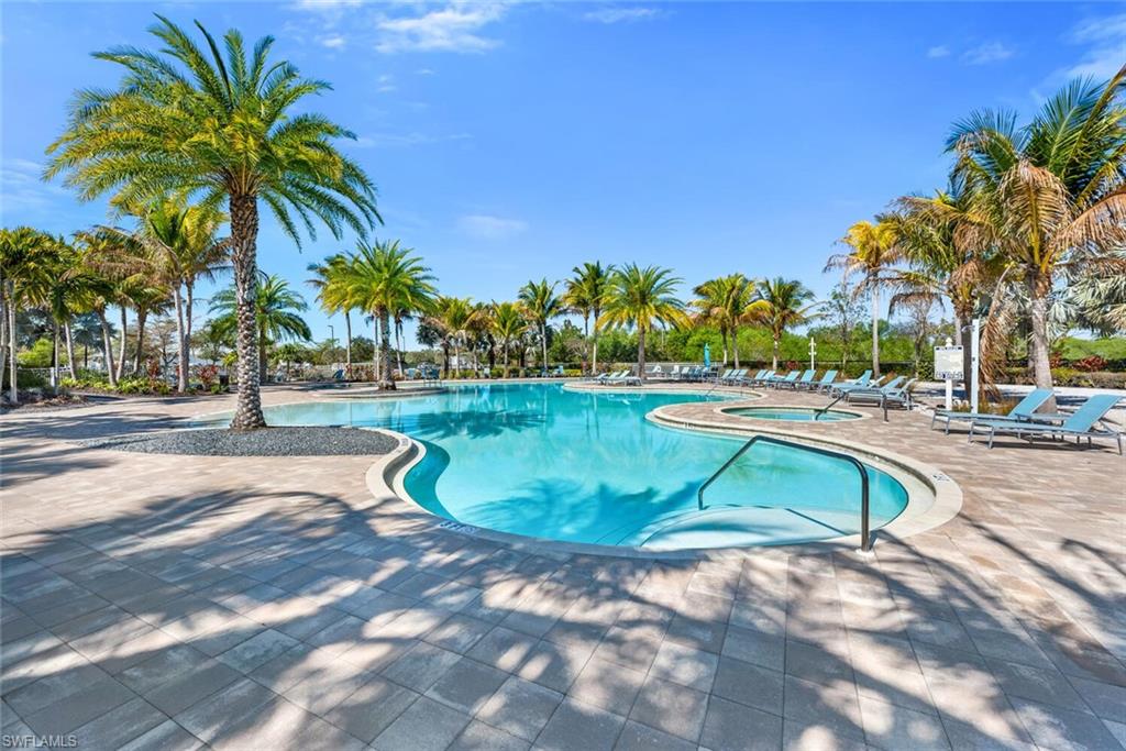 Community pool featuring a patio area