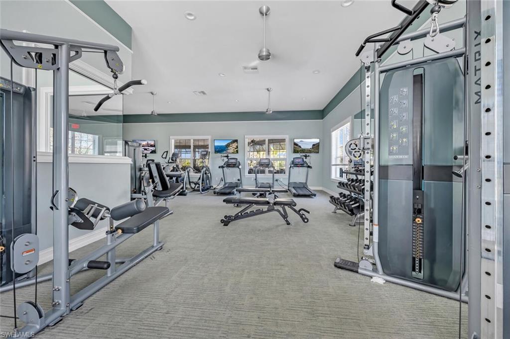 Workout area featuring recessed lighting